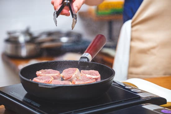 canva chef frying meat MAESuX3UsKE