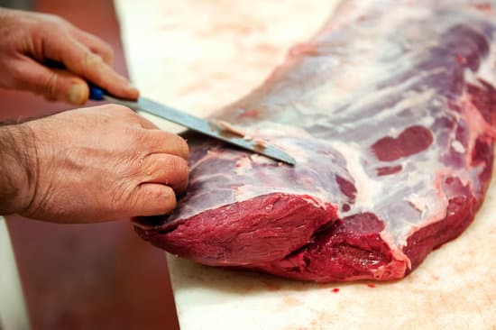 canva close up of butcher cutting meat MAEO 9l3qk0