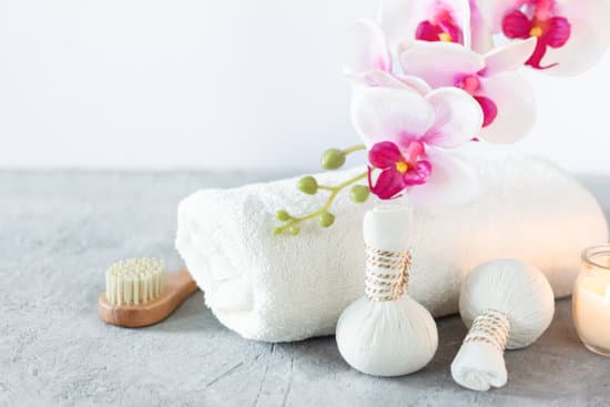 canva composition of spa equipments and orchid flowers MAEOiBFT g0