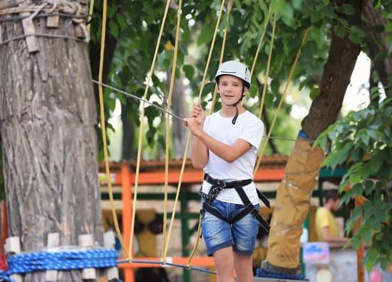 canva cute boy climbing in adventure park MAD9UGUcKzY