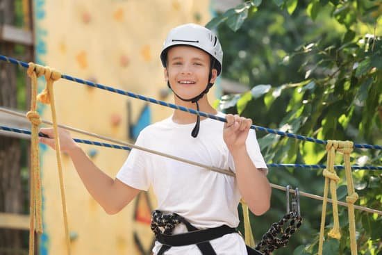 canva cute boy climbing in adventure park MAD9UGtaMGE