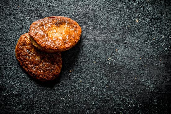 canva cutlets from fresh meat on stone background MAEP 97coCM