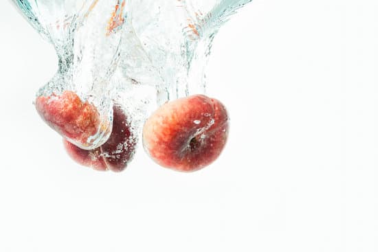 canva doughnut peaches splashing into water MAENm6MTKE8