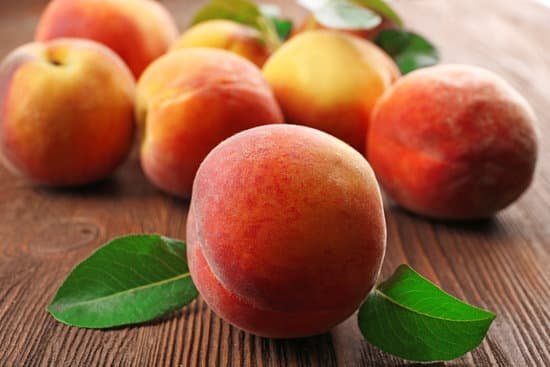 canva fresh peaches on a table MAD MjfYq74