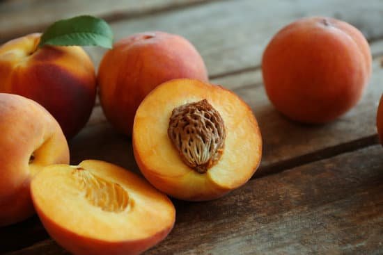 canva fresh peaches on a wooden background MAD Q0SCw 8