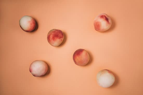 canva fresh peaches on beige background MAEQi9RhUTg