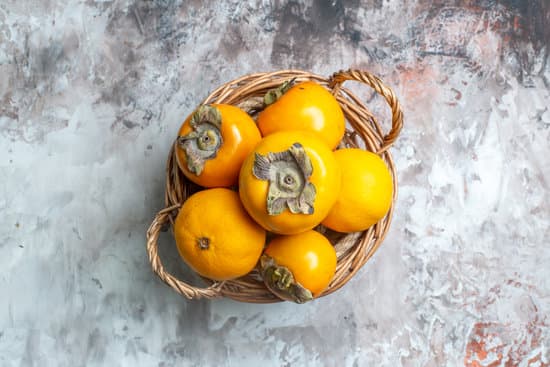 canva fresh persimmons in basket MAEQcZAAD7w