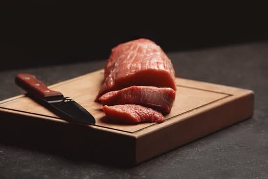 canva fresh raw meat on wooden board MAD9T3lNE2k