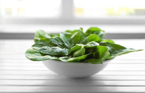 canva fresh sorrel in bowl on wooden table MAD Q RRhYs