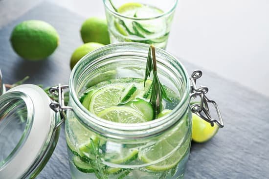 canva glass jar with rosemary and lemon drink MAD9T4mQ0j0