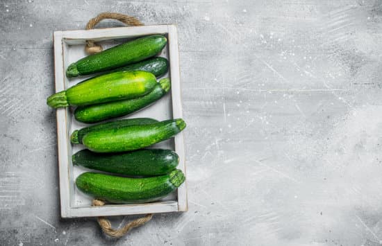 canva green zucchini on tray MAEPh52UFN0