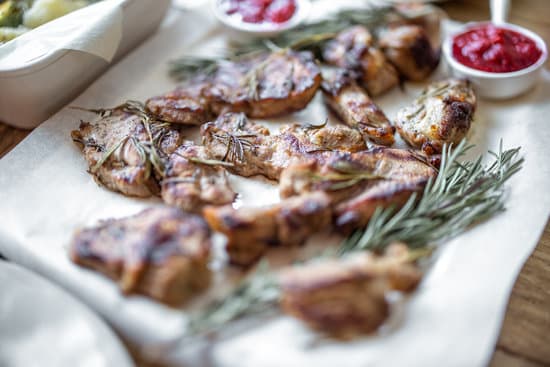 canva grilled meat with rosemary and sauce MAETg8rHUbU