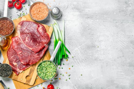 canva healthy raw beef meat with a variety of organic food MAEPoIRgjrw