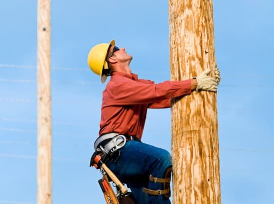 canva man climbing a pole MAB8CW dPtI