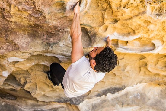 canva man rock climbing MADIOrlrbP4