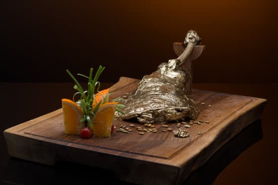 canva meat steak wrapped in foil and orange slices MAESbXLePbs