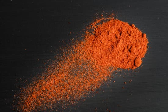 canva paprika powder on black background MAESphY8O7s