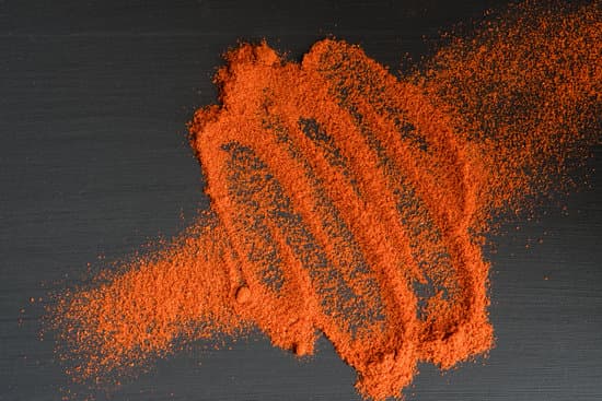 canva paprika powder on black background MAESpscWkBg