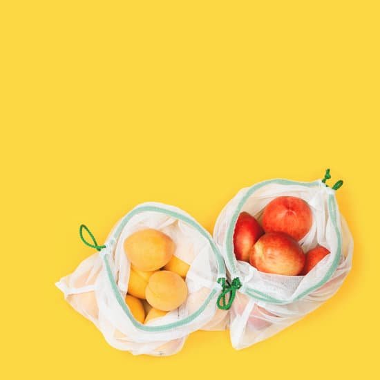 canva peaches and apricots in eco bag on yellow background MAEF4uR4YU0