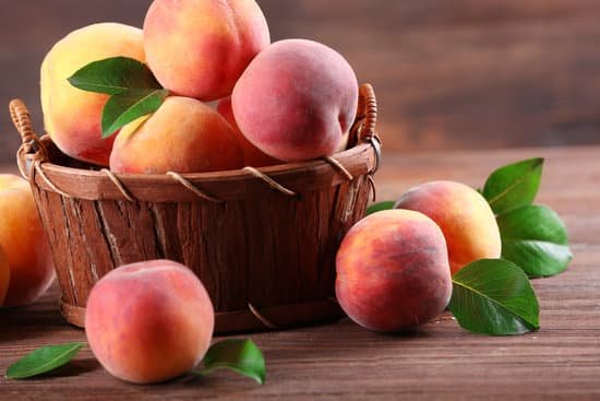 canva peaches in a wicker basket MAD MlEVXkM