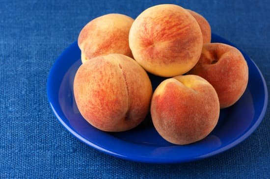 canva peaches in plate MAB J6f2BsM