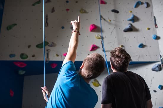 canva people climbing in indoor climbing gym MAEMOAJliaM