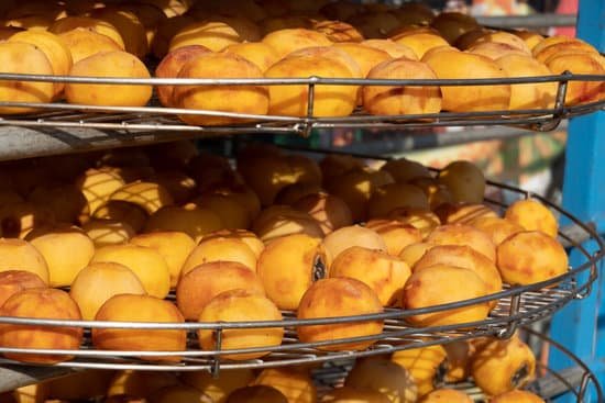 canva persimmon sold in market MAEBcQibP9g