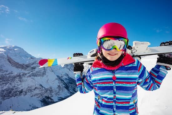 canva person holding snowboard on a ski slope MAD gg5TSA0