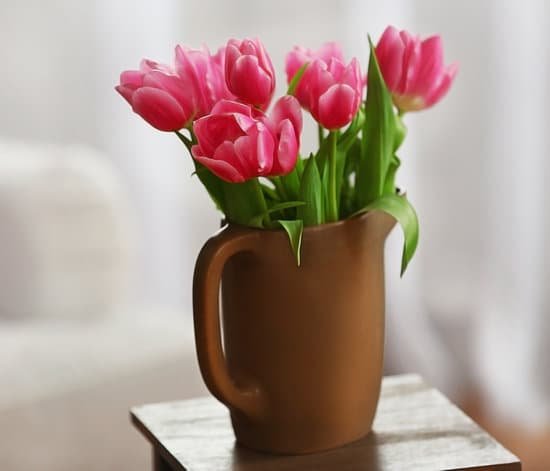 canva pink tulips in a vase MAD QiDQmS4