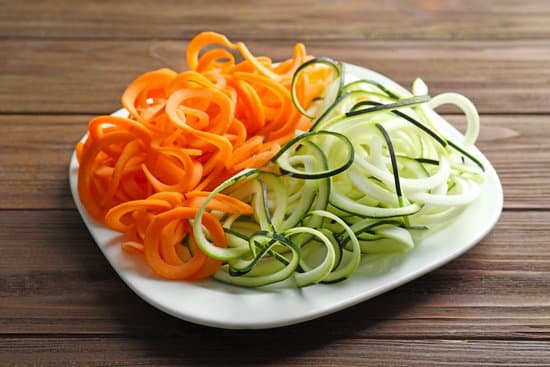 canva plate with zucchini and carrot strips MAD9T zjod0