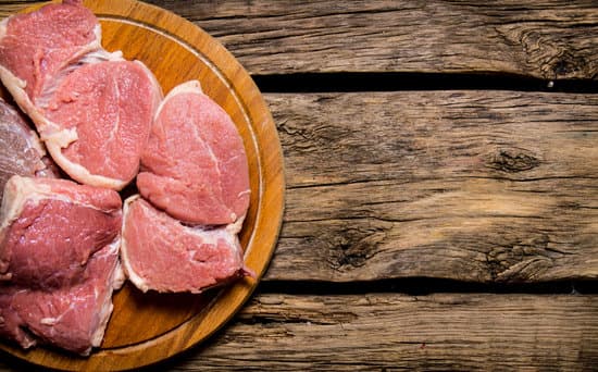 canva raw fresh meat on cutting board. MAESqqz3aaI