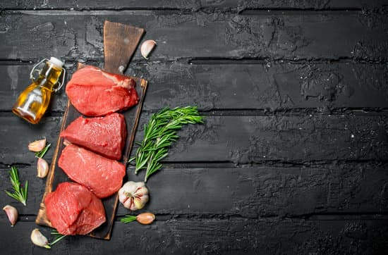 canva raw meat on a wooden board flatlay MAEPdhtsy 8