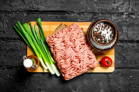 canva raw minced meat with green onions and spices flatlay MAEPl7OFrTI