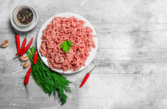 canva raw minced meat with spices and herbs flatlay MAEPRdinHl0