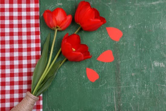 canva red tulips in a vase MAD MTTAJpQ