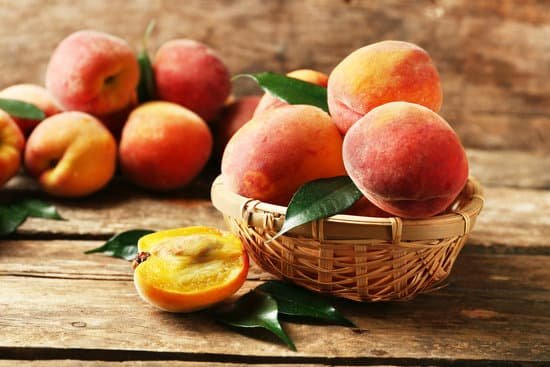 canva ripe peaches in a basket MAD MaR9ytE