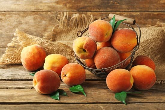 canva ripe peaches on a table MAD MXSmWDE