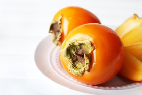 canva ripe persimmons on a plate MAD L6dWi6A