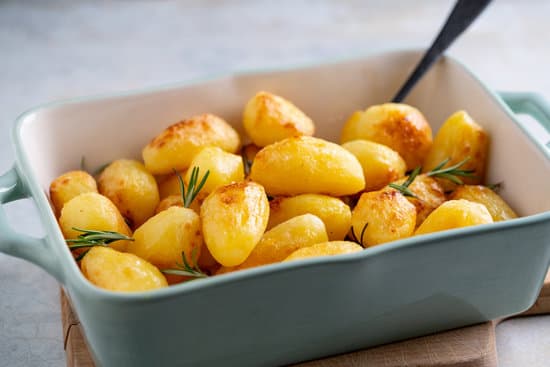 canva roasted young potatoes with rosemary MAEQkSni1NE