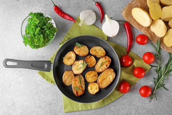 canva rosemary potatoes in a pan MAD9T3OaCNg