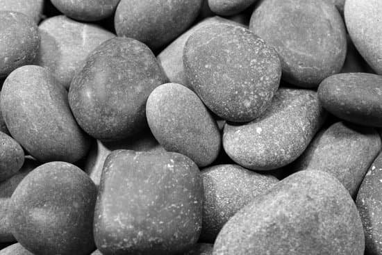 canva sea pebbles background MAD Mv5tH3o