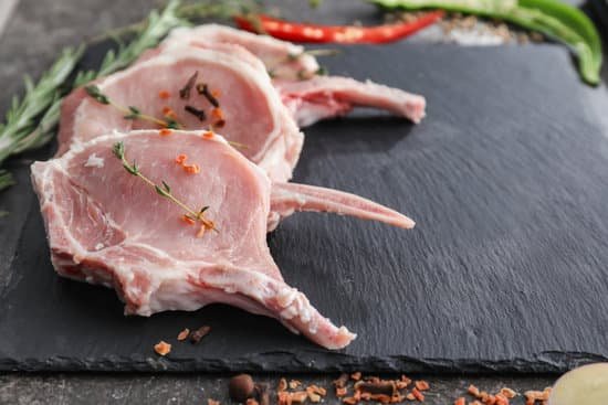 canva slate plate with fresh raw meat and spices