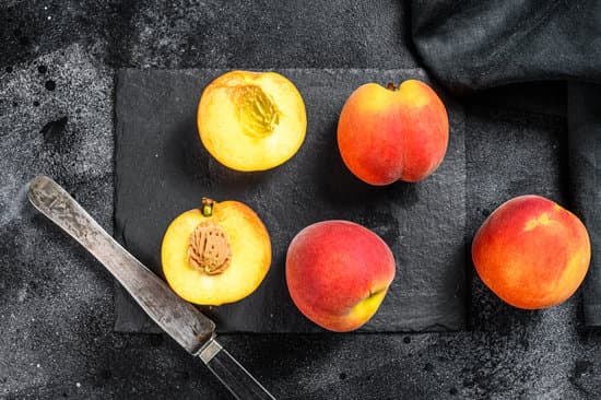 canva sliced peaches in the table MAERJ6wsRz8