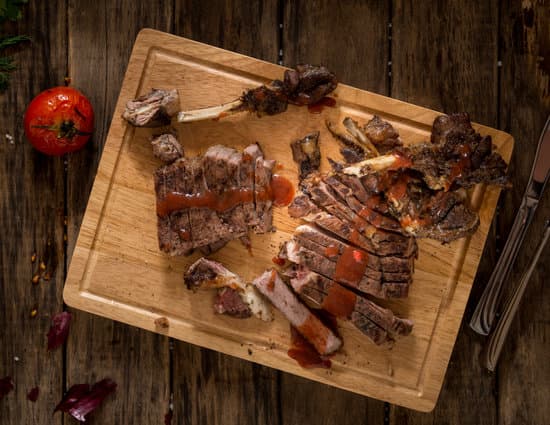 canva slices of grilled meat on wooden board flatlay MAESbR2bXi4