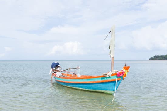 canva small fishing boat in the sea MAESbMwRGZI