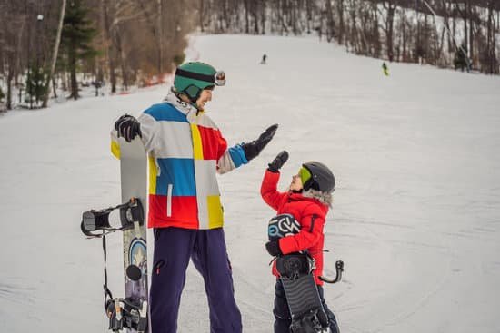 canva snowboard instructor teaches a boy to snowboard MAELBy D3Oc