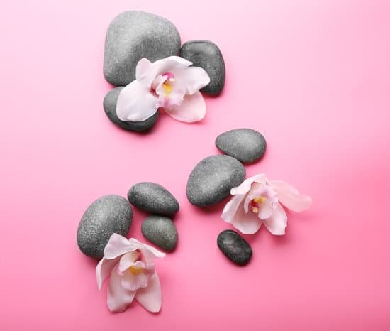 canva spa stones and white orchid MAD QpflZ48