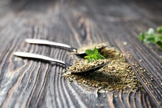 canva spoons with aromatic dried oregano on wooden background MAD9TzT20 8