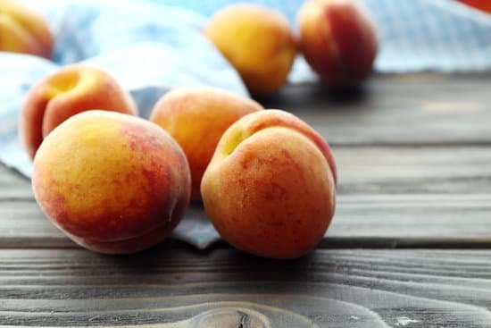 canva sweet ripe peaches on table close up MAD MfypEn0