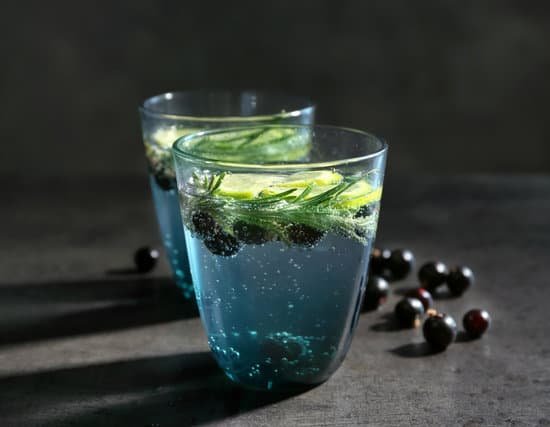 canva two glasses of blue rosemary drinks MAD9Tiypeak